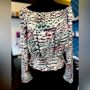 Naked Zebra long sleeved crop. Can wear on or off shoulder. New with tags.